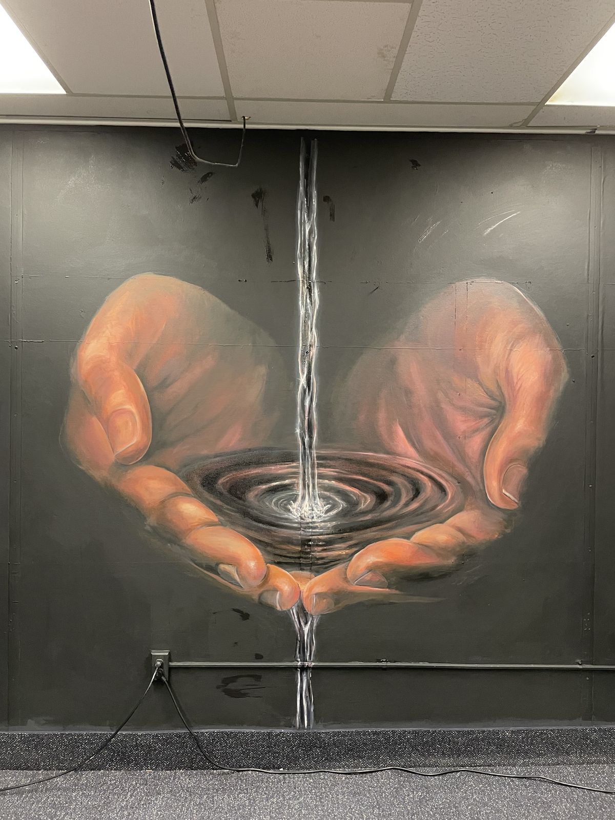 Hands Cupping Water